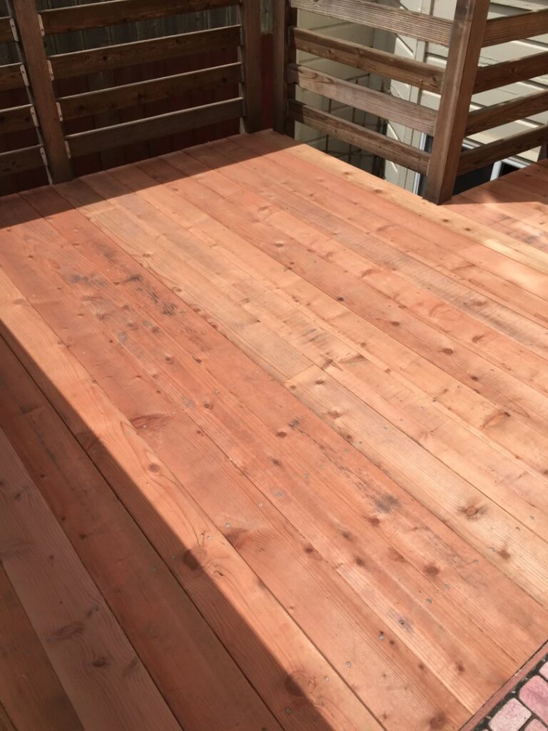 A newly installed wooden deck by Kennyman The Handyman Inc. in San Francisco, CA