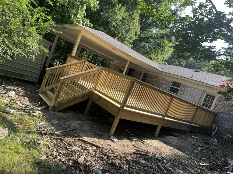 A newly constructed wooden deck with stairs and railings, showcasing quality craftsmanship by JD Handyman service LLC in Miami, FL.