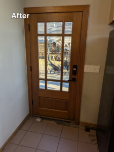 A newly installed wooden door with glass panels after replacement by All Trades Home Improvement in Hobart, IN.