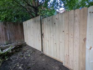 New wooden fence and gate installation completed by Adam's Handyman and Contracting in Lancaster, PA.