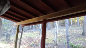 Freshly built wooden patio cover framing by Handyman Heroes, providing outdoor construction in Roswell, NM.