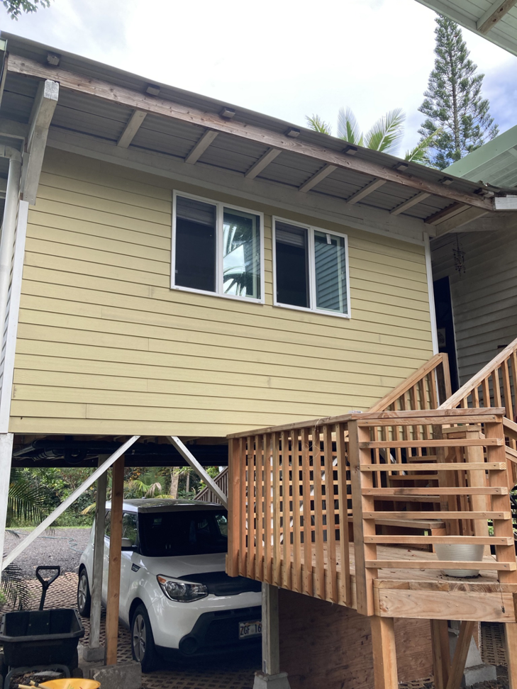 Newly built wooden staircase and window installation completed by Handyman Jeff in Keaau, HI