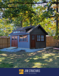 A newly built backyard shed with a dark gray exterior and wooden trim by JDM Outdoors of Robinson in Pittsburgh, PA.