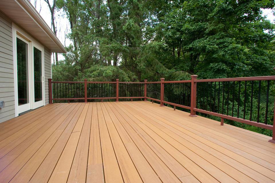 A newly built composite deck with dark railings by St. Charles Deck in St. Charles, MO