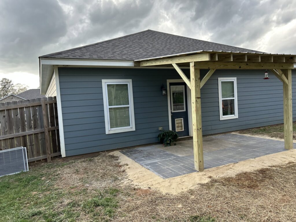A newly constructed wooden pergola and patio with pavers installed by BK's Handyman Services in Carlton, OR.