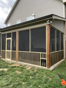 A newly constructed screened porch with wooden framing and dark screens, built by Richwood Remodeling & Outdoor in Nashville, TN.