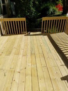 A newly built wooden deck by Rosewalls Handyman & Remodeling in Des Moines, IA.