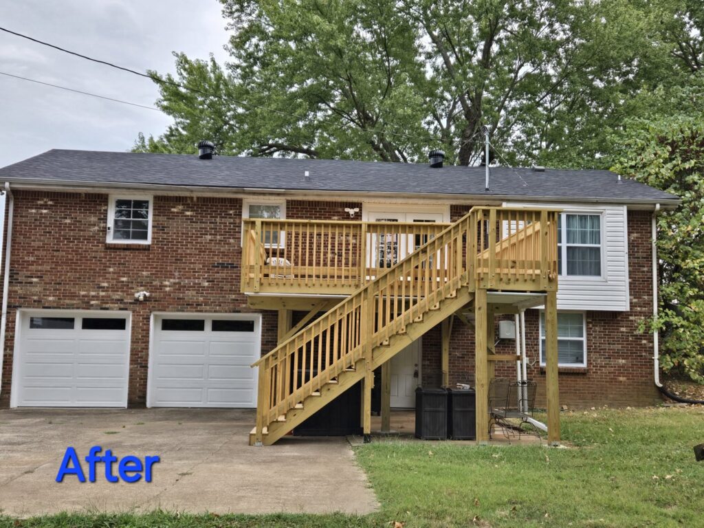 The exterior of a house showcasing a newly built wooden deck and stairs, a construction project by Huff Consolidated Enterprises LLC in Clarksville, TN.
