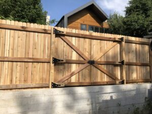 A newly built wooden fence and gate, an outdoor project by Infinite Creations Construction, LLC in Denver, CO