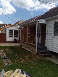 A newly built wooden porch under construction by Indoor/Outdoor Home Repairs in Parma, OH.