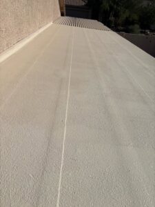 A freshly coated flat roof, showcasing the quality work of Mayitos roofing LLC in Tucson, AZ.
