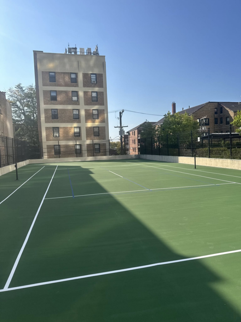 A newly constructed outdoor tennis court, a commercial project completed by Specialized Building Services Inc. in Chicago, IL.