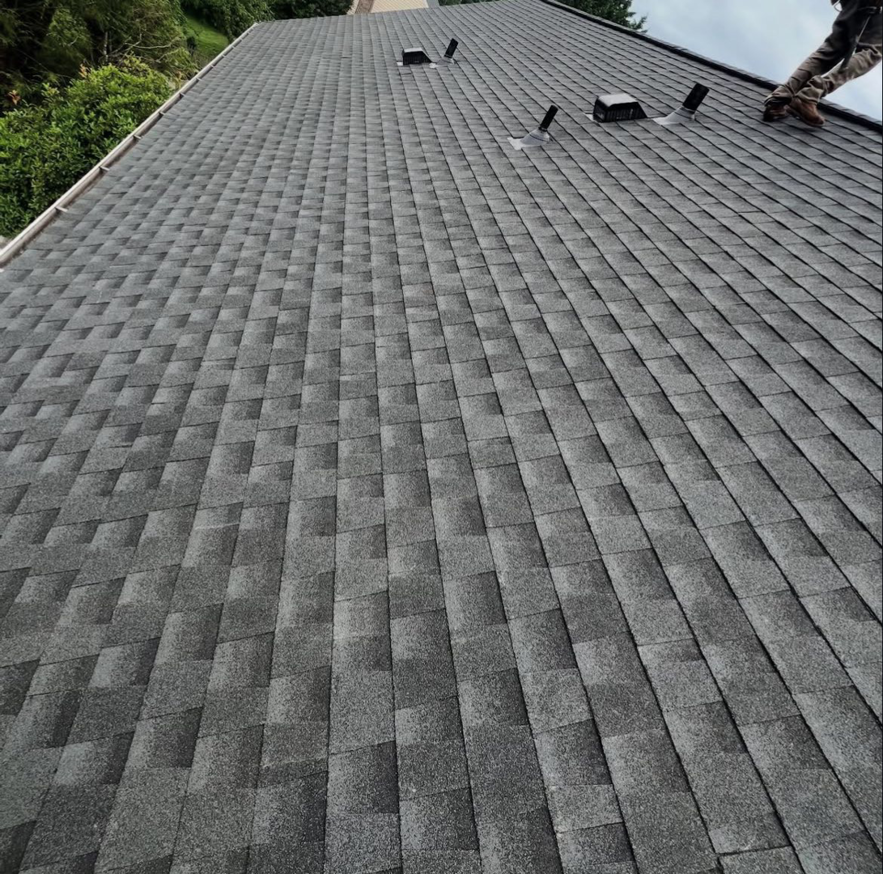 A view of a newly installed asphalt shingle roof completed by Goldstone Contracting Inc. in Gambrills, MD.