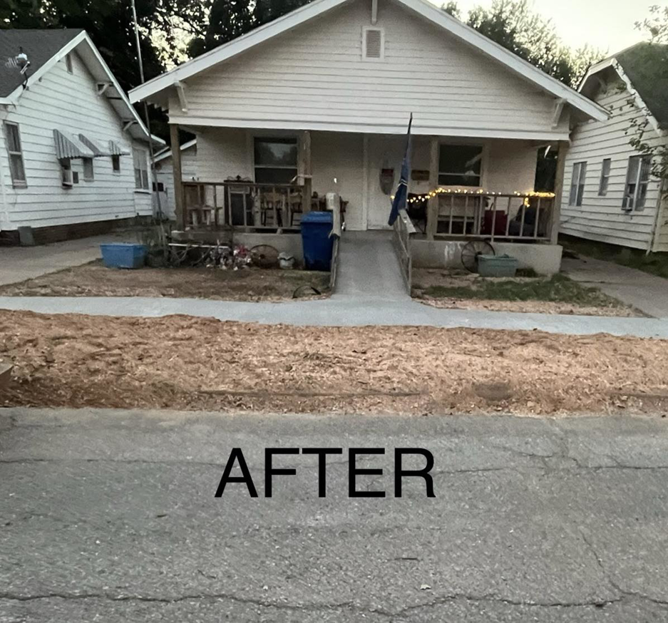 Newly installed concrete ramp and mulched area in front of a house by Reasonable Tree Service in Concord, CA.