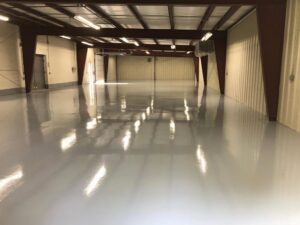 A newly installed, shiny epoxy floor in a commercial space by Alpine Painting and Sandblasting Contractors in Paterson, NJ.