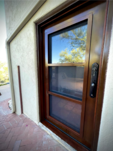 A newly installed exterior screen door by Chavez Wrought Iron, LLC in Tucson, AZ