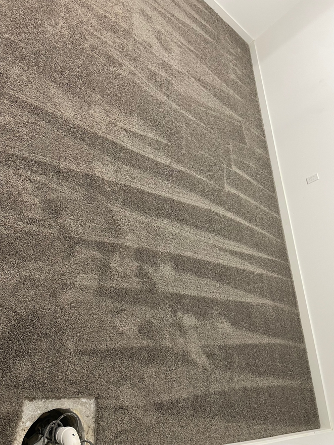 Newly installed gray carpet on stairs by Prime Construction ent. in Bloomingburg, NY