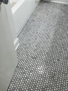 A newly installed hexagonal tile floor, a quality service from Gonzalez Services Corp. in Nashville, TN.