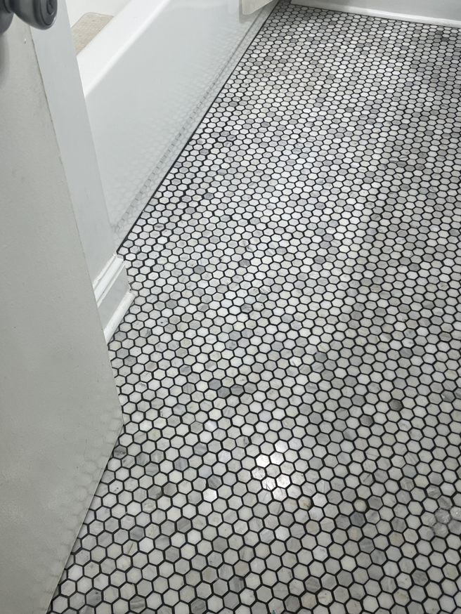 A newly installed hexagonal tile floor, a quality service from Gonzalez Services Corp. in Nashville, TN.