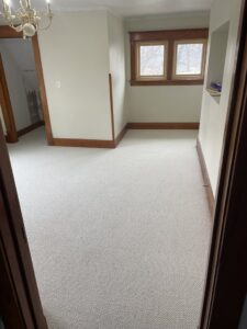 Newly installed light-colored carpet in an empty room by Creative Carpets in North Las Vegas, NV.