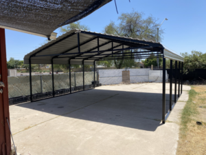 A newly installed metal carport frame on a concrete slab by T.Harris Builders LLC in Gilbert, AZ