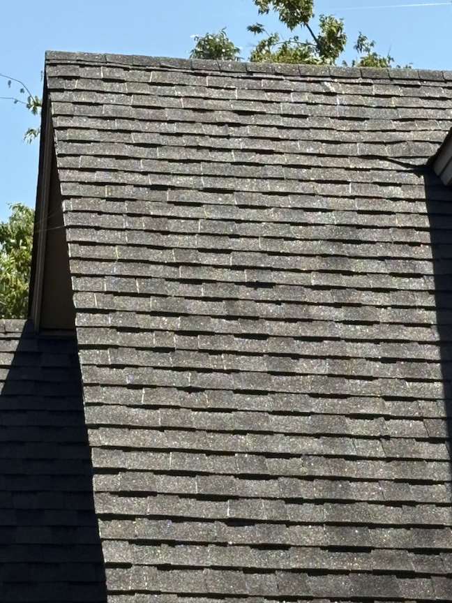 A newly installed shingle roof completed by Hansen Construction Stillwater in Stillwater, OK.