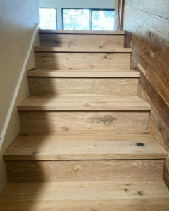 Newly installed unfinished wooden stairs, showcasing quality craftsmanship by Savala's Remodeling Services in Austin, TX.