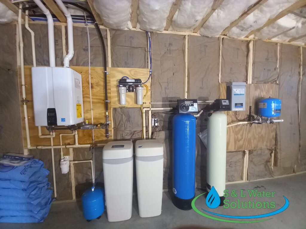 A newly installed water treatment system, water heater, and plumbing by S & L Water Solutions in Hagerstown, MD.