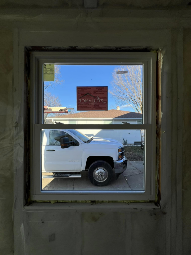 A newly installed window, viewed from the interior, by Sandoval Contracting & Remodeling in San Antonio, TX.