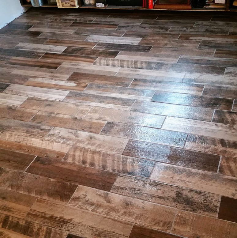 Newly installed wood-look plank flooring, showcasing a completed handyman job by Northup Flooring LLC in Greenville, SC.