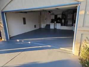 A newly painted or sealed garage floor, a completed project by Ace Handyman ABQ SF in Albuquerque, NM