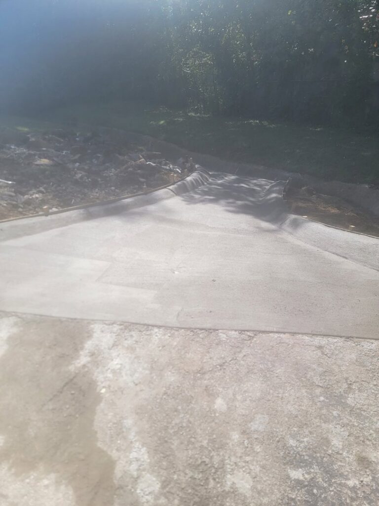 A newly poured concrete pathway, demonstrating quality work by Gonzalez Services Corp. in Nashville, TN.