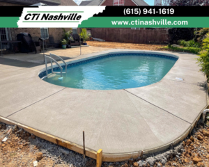 A newly poured concrete pool deck, expertly installed by CTi Nashville, enhancing an outdoor space in Antioch, TN.