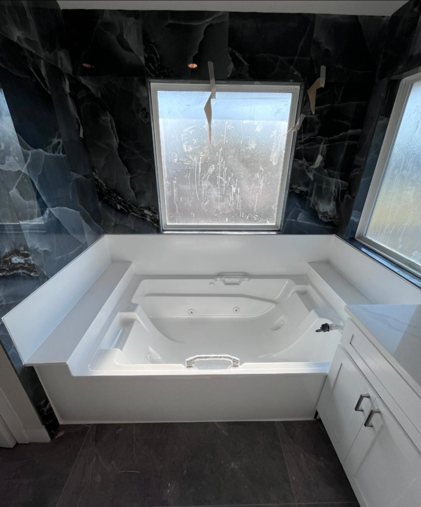 A newly refinished jetted tub as part of a complete bathroom renovation by Immaculate Refinishing in Arlington, TX.
