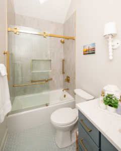 A newly remodeled bathroom featuring a modern shower, toilet, and vanity by BearHome Service in Mount Pleasant, SC