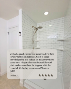 A newly tiled shower with subway tiles and shelves, showcasing a bathroom remodel by Modern Bath, LLC in Knoxville, TN.