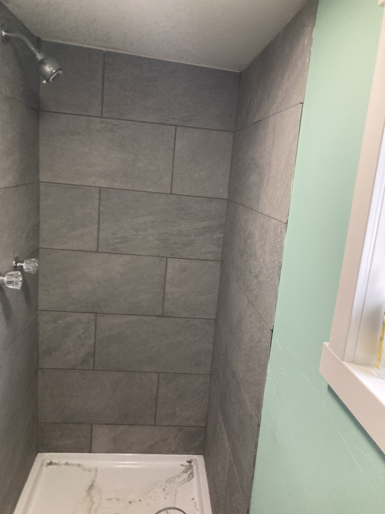 Newly tiled shower installation and repair by Handyman Jeff in Keaau, HI