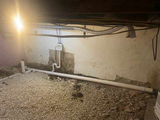 A newly waterproofed basement wall with a drainage mat installed by Foundation Repair and Waterproofing in Philadelphia, PA.