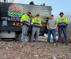The Nooga Junk team standing proudly in front of their branded junk removal truck in Chattanooga, TN.