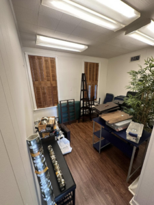 An office space filled with items for cleanout and junk removal by DJ's Hauling & Junk Removal Services in Georgetown, DE.