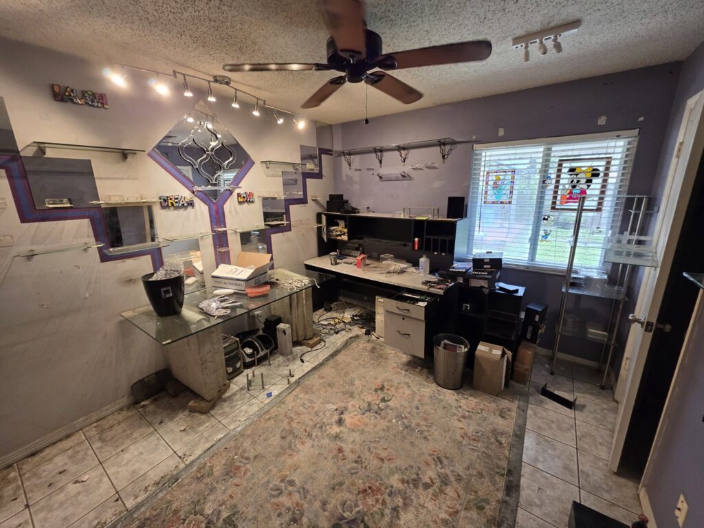 A cluttered office space undergoing a cleanout, ready for junk removal by Westish Junk Removal LLC in Orlando, FL.