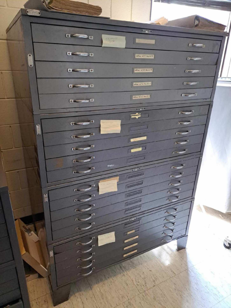 Stack of old metal filing cabinets ready for removal by Remove Recycle Remarket in Troy, MI.