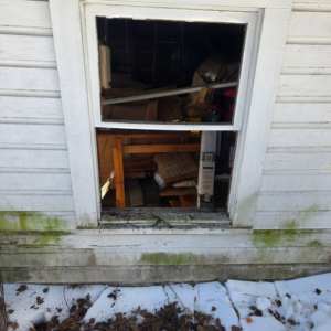 An old window removed from a house exterior, showing the opening and interior, by Noble Home Improvements in Edison, NJ.