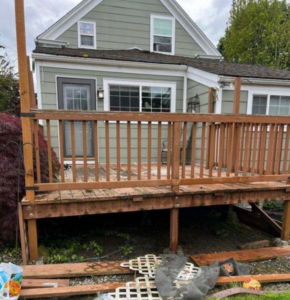 An old wooden deck in need of repair or replacement by Imagine Construction & Home Remodeling in Lexington, KY.