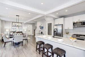 Open-concept kitchen and dining area remodel by Cabido Design, a trusted handyman service in Brentwood, MD.