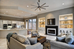 An open-concept living room and kitchen remodel showcasing modern design by Home Platinum Services, LLC in Plano, TX