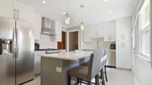 A spacious open-plan office space with cubicles and exposed brick walls, built by ETI Construction in Chicago, IL.