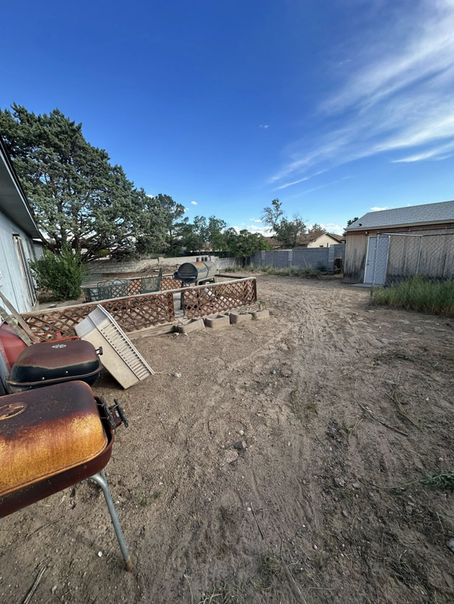 An organized backyard patio area after cleanup services by Appleton Residential Services in Rio Rancho, NM.