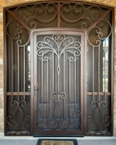 Ornate security screen door with decorative side panels installed by Steel Creations & Fabrication, INC in Glendale, AZ
