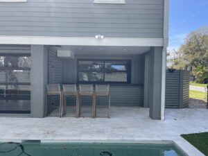 Outdoor bar area with a roll-up window installed by Total Garage Works in Indian Trail, NC.
